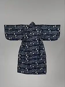 Child's kimono taken in with kata-nue-age and koshi-nue-age (pleats)