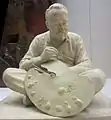 Pennsylvania Academy of the Fine ArtsStatuette of Thomas Eakins Sitting by Murray (1907). This depicts Eakins at work on his 1889 painting The Agnew Clinic.