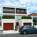 Cement rendered pavilion style semi-detached houses in Dover Heights, New South Wales
