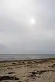 Witsum beach with neighbouring island Amrum at the horizon