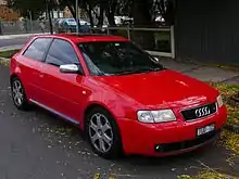  A medium-sized front-engined car with three doors