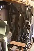 Casavant Frères ranks of round, grey metal organ pipes of all sizes inside one of the swell boxes inside the organ.