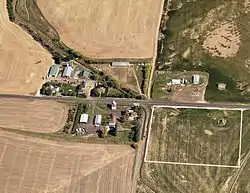2016 aerial photo of Lamoine. White square in bottom right corner represents original town site of Arup. Lamoine schoolhouse is visible in upper right corner of square.