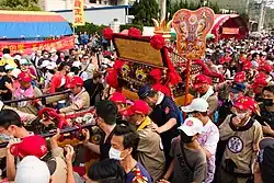 Mazu's litter surrounded by pilgrims