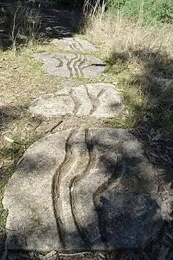 A Hill, a River, Two Rocks and a Presence (1997) by John Davis