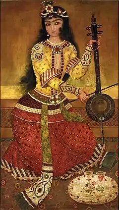 A woman playing the kamancheh. Detail from a wall painting in which Mohammad Ali Shah Qajar is surrounded by musicians and dancers. Painted by Abuʾl-Qasim, dated 1816.