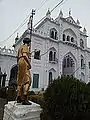 A statue holding chain for earthing purpose at main gate