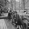 Princess Juliana, Queen Wilhelmina and Rie Stokvis climb the front steps upon their arrival