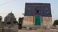Shah Ali Akbar's tomb (left) is adjacent to that of his mother's (right)