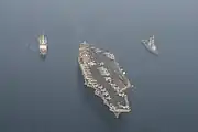 USS&nbsp;Nimitz and the frigates Jean Bart and Auvergne on 19 September 2017.