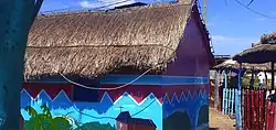 Colorful renovation of the huts of the accommodation site ("Mille Logements") intended to accommodate the homeless after the Brazzaville arms dump blasts in 2012.