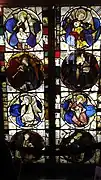 General view of the Angel Musicians stained glass window with the eight music players in individual medallions