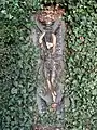 A glazed terracotta plaque approximately 40 metres (130 ft) west of the fountain