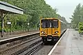 A Class 508 arrives with a service to Hooton.