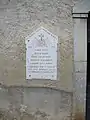 War memorial plaque on the church