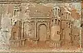 Frieze depicting the door to the town