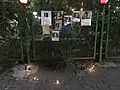 Tributes left on a wall in the Ekbatan district
