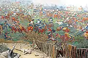 Painting detail: the Duke of Wellington and his staff (top right) sheltering from French cuirassiers in a square of Highland infantry