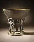 Bowl supported by 3 figures; 850–1500; resist-painted ceramic; height: 28.58&nbsp;cm (111⁄4 in.), diameter of the bowl: 19.69&nbsp;cm (73⁄4 in.); from Colombia; Los Angeles County Museum of Art (USA)