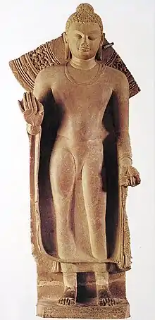 Buddha, standing, inscribed: "Gift of Abhayamira in 154 GE" 474 CE in the reign of Kumaragupta II. Sarnath Museum.