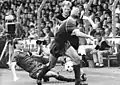 Matthias Sammer with the ball (center) fighting with Jörg Büdner (left) and Marco Köller (in front) during the match.