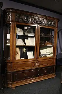 A cabinet made of the wreckage of HMS Foudroyant and containing objects also made of the same ship