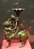 Gilt copper candlestick of Samson with lion, probably from Dinant (Belgium), c. 1200–1250