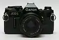Black model with 50&nbsp;mm f/1.8