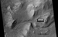 Close view of channel that has cut deeply into the landscape