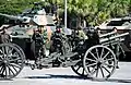 A Brazilian gun on wooden wheels with a limber draught by horses