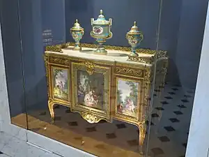 Louis XVI style commode of Madame du Barry; by Martin Carlin (attribution); 1772; oak base veneered with pearwood, rosewood and amaranth, soft-paste Sèvres porcelain, bronze gilt, white marble; 87 x 119&nbsp;cm; Louvre