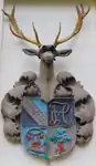 Corps Hubertia's old crest on the side of the current house of the fraternity. Here temporarily wearing fencing goggles during the 145th inaugural celebration.