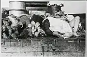 Civilians of the Lokka village killed on July 14 1944 being transported to the graveyard.