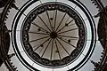 Looking up the dome through the circular chandelier