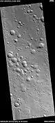 Possible expanded secondary craters, as seen by HiRISE under HiWish program These craters may have become much wider, as ice left the ground around the rims.