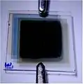 An electrochromic slide in colored state