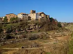 The village on its sandy escarpment