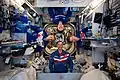 Four Expedition 59 astronauts pose for a playful portrait inside the Harmony module on May 4, 2019