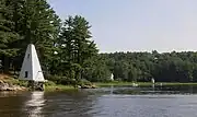The fog signal (left) was tended by the keepers of the Doubling Point Range Lights a short distance downriver.  The keeper's house is in the center and the front range light is to the right.