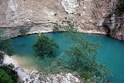 Fontaine-de-Vaucluse, karst spring of the Sorgue, characterised by an upward movement of water from the depth of over 315 metres (1,033&nbsp;ft)