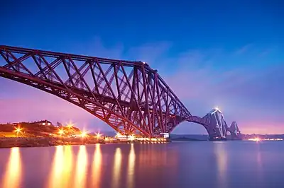Image 11The Forth Bridge is a cantilever railway bridge over the Firth of Forth. It was opened on 4 March 1890, and spans a total length of 2,528.7 metres (8,296 ft). It is often called the Forth Rail Bridge or Forth Railway Bridge to distinguish it from the Forth Road Bridge.Photo credit: George Gastin