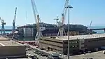 Wreck after being lighten and relocated to the Superbacino dock in Genoa, 28 August 2015