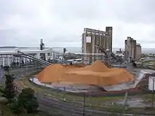 Image 34Storage Silos on the Gladstone waterfront, an industrial area in the water catchment area (from Environmental threats to the Great Barrier Reef)