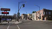 Business flanking Armitage and Keeler