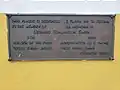 Historical marker for the construction of Queen Emma Bridge