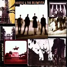 A collage of blurred photographs forms the album cover