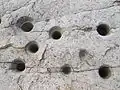 Close up view of bedrock mortars