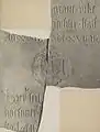 Part of a gravestone. The photo dates from 1919.