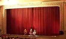 Main curtain used as a backdrop at a cinema.
