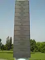 One of the four tables with names and dates of battles